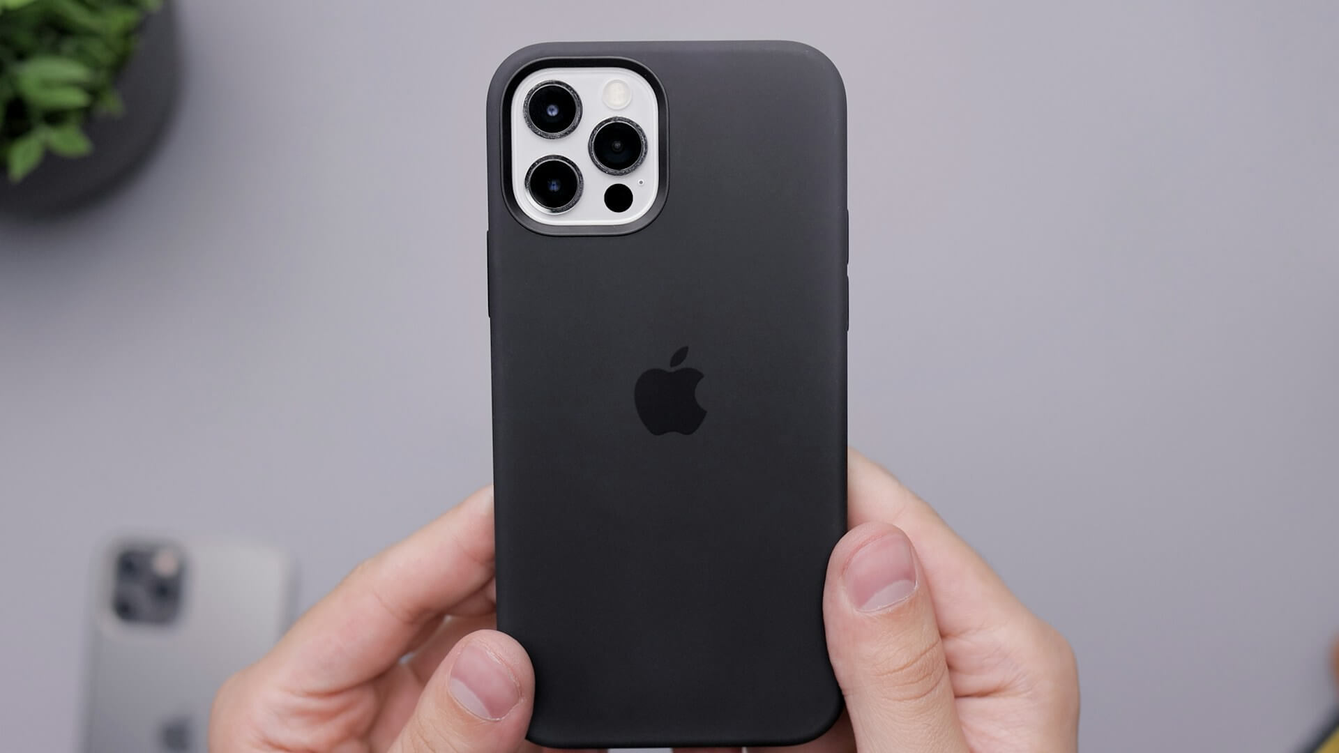 an iPhone with a black case
