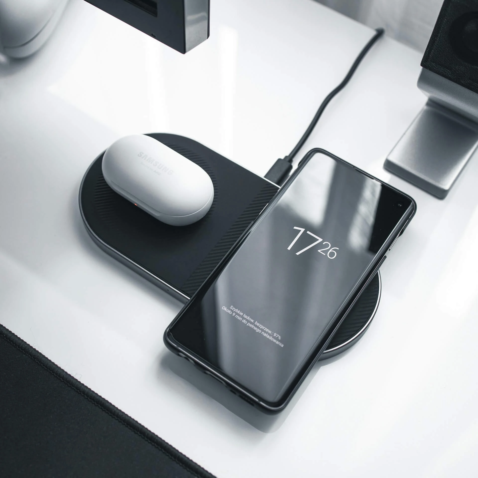 two devices being charged wirelessly